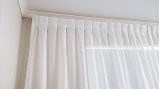 Inverted pleat sheer curtain