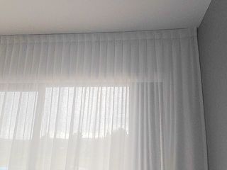 White inverted pleat sheer curtains