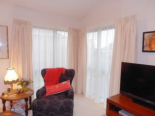 French pleat curtains on single track