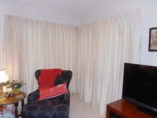 French pleat curtains on single track