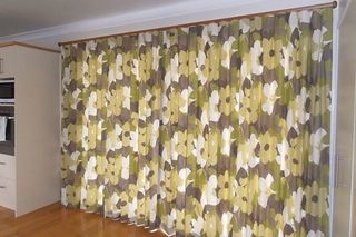 Inverted pleats on wooden rod