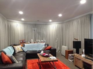 Inverted pleat curtains on bent track