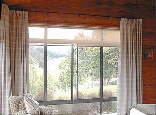 Inverted pleat curtains on 25mm rod