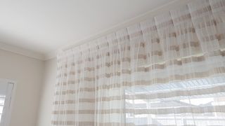 Inverted pleat sheer curtain