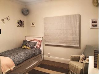 Roman blind in Ticking fabric